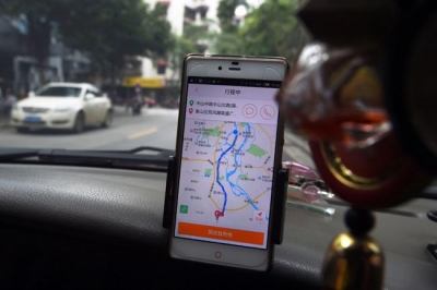 Apple invierte en China contra taxis y Uber