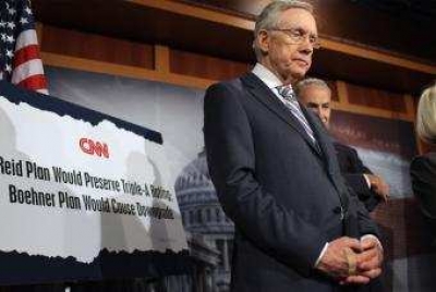 El l&iacute;der de la mayor&iacute;a dem&oacute;crata en el Senado, Harry Reid, ayer durante una conferencia de prensa en Washington.- CHIP SOMODEVILLA (AFP)